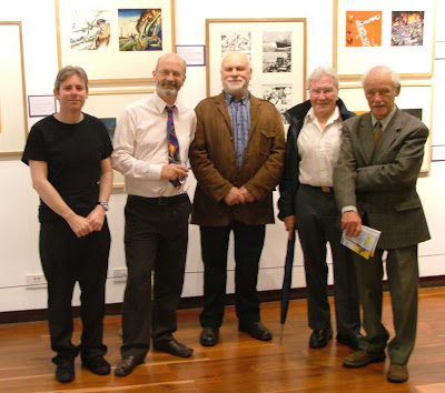 Commando crew at the exhibition's opening night. From left to right: Scott Montgomery (deputy editor), Calum Laird (editor), George Low (former editor), Ian Kennedy (artist) and Gordon Livingstone (artist).
