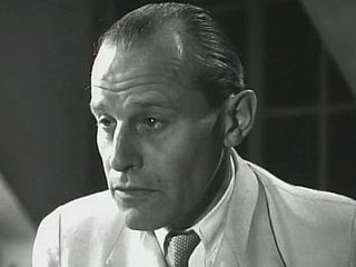 Actor Geoffrey Wincott in the 1948 film Dick Barton, Special Agent, playing a villain