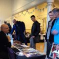 Artist Gary Erskine chatting with fans in the Clock Tower at last year's Lakes International Comic Art Festival. Far left: locally-based artist Kate Holden. In the background: artist Conor Boyle on the Disconnected Press stand