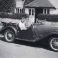 Bob Batholomew, circa 1949, in his red Singer Le Mans sports car. Photo via Bear Alley.