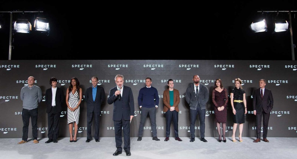 Eon Productions, Metro-Goldwyn-Mayer and Sony Pictures Entertainment announced the 24th James Bond adventure  SPECTRE. in December. Pictured: (left to right) Rory Kinnear, Ben Wishaw, Naomie Harris, Ralph Fiennes, Sam Mendes, Daniel Craig, Andrew Scott, Dave Bautista, Monica Bellucci, Léa Seydoux and Christoph Waltz. Image © 2014 Columbia TriStar Marketing Group, Inc. and MGM Studios. All rights reserved. Photo: David Dettmann