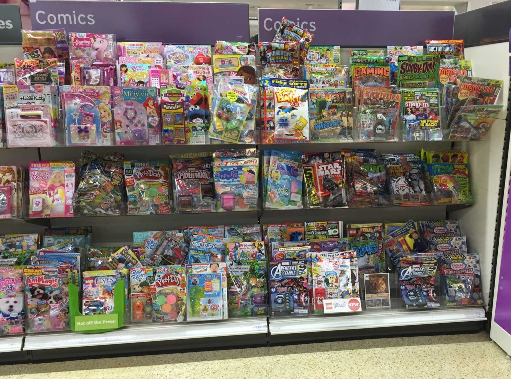 Sainsbury's Lancaster Comic Section, August 2015. In addition to this display, comics feature in a separate "Recommended Reading" section on the end of this aisle, its titles including The Beano, Skylanders and other titles.