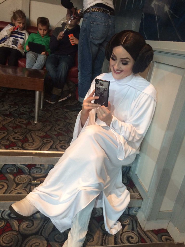 A Star Wars fan delights in a Star Wars find at Leamington Comic Con. Photo: Antony Esmond