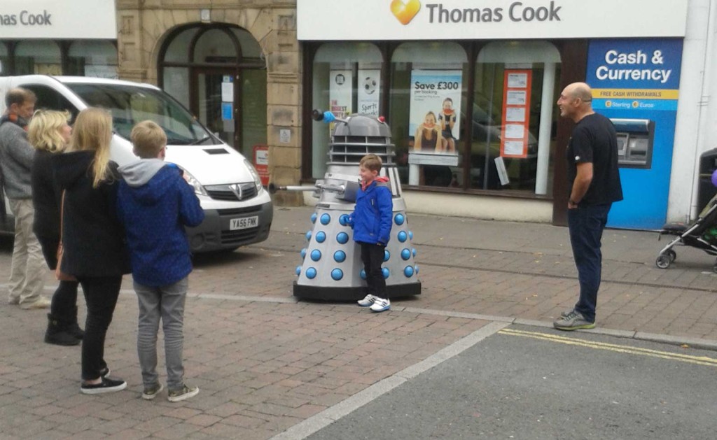 Plenty for kids to enjoy at LICAF - including getting snapped with a Dalek. Photo: Norman Boyd