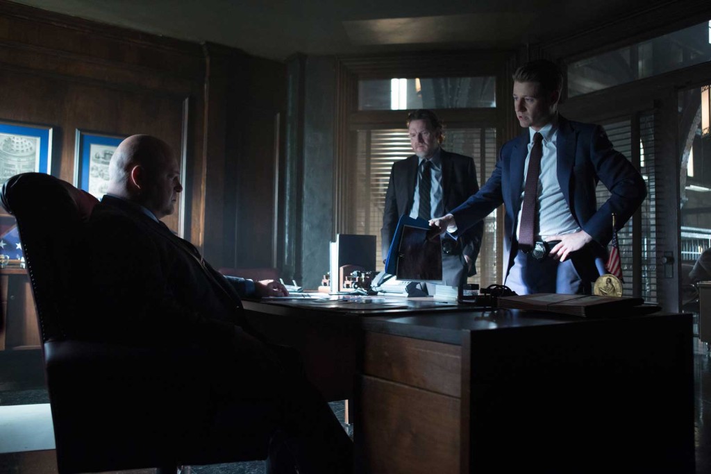Michael Chiklis as Nathaniel Barnes, Donal Logue as Detective Harvey Bullock and Ben McKenzie as Detective James Gordon in Gotham.