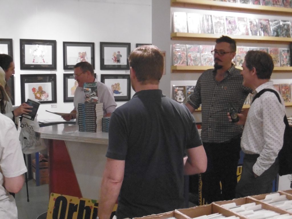Artist Rian Hughes chatting with 2000AD's Michael Molcher. Photo: Richard Sheaf