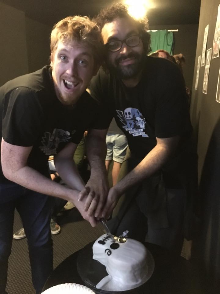 Steve Gregson and Matthew Simmons celebrate the success of Bastard Galaxia - with cake.