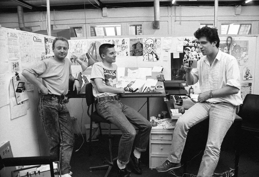 Brett Ewins, Jamie Hewlett and Steve Dillon in the Deadline office in 1988. Photo courtesy Steve Cook / National Portrait Gallery