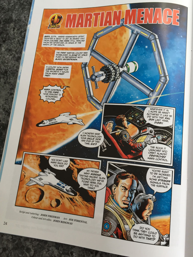 Much of the background to the Dan Dare audio adventures was based on a story bible originally created for a proposed comic strip revival of the character commissioned by Print Media Productions for STRIP Magazine. Lucas Bowers created some character and uniform designs, while John Ridgway created several spacecraft designs. One strip. "The Martian Menace" by John Freeman, Joe Pimenetel and John Ridgway, was completed, eventually published in Spaceship Away.