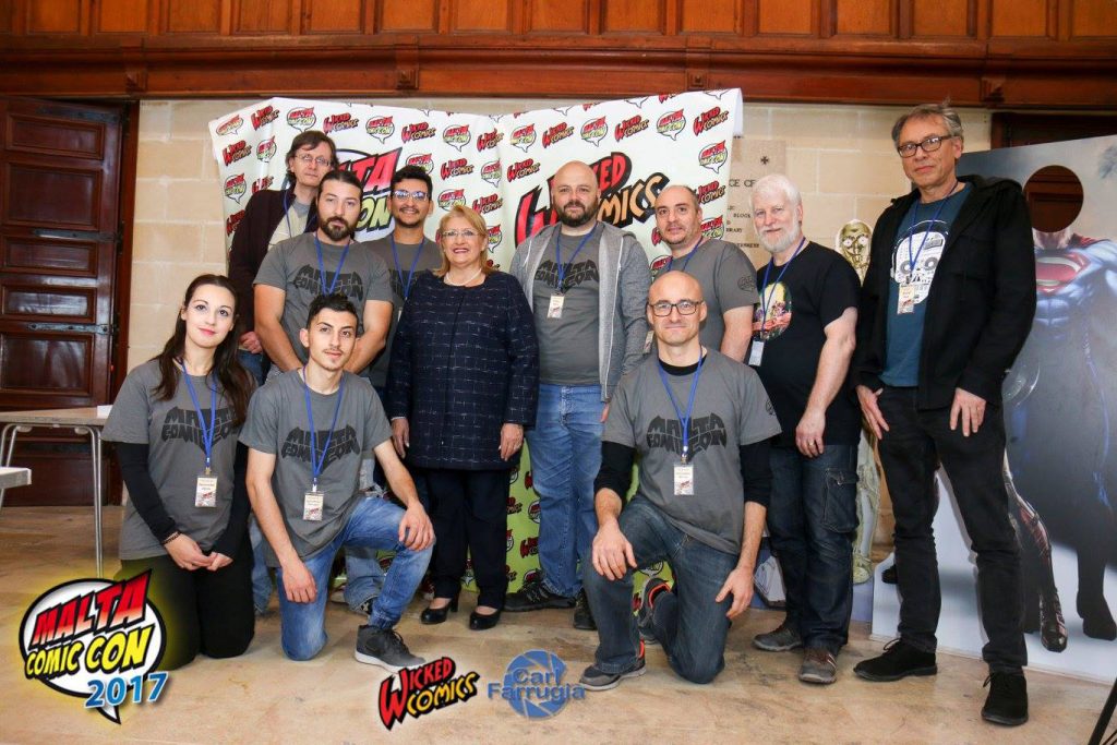 Pictured: Wicked Comics with her excellency Marie-Louise Coleiro Preca [ President of Malta ] — with Samantha Abela, Mark Ellul, Christian Debono, Marie-Louise Coleiro Preca, Fabio Agius, Chris Le Galle, Christopher Muscat and Tim Perkins at Mediterranean Conference Centre.