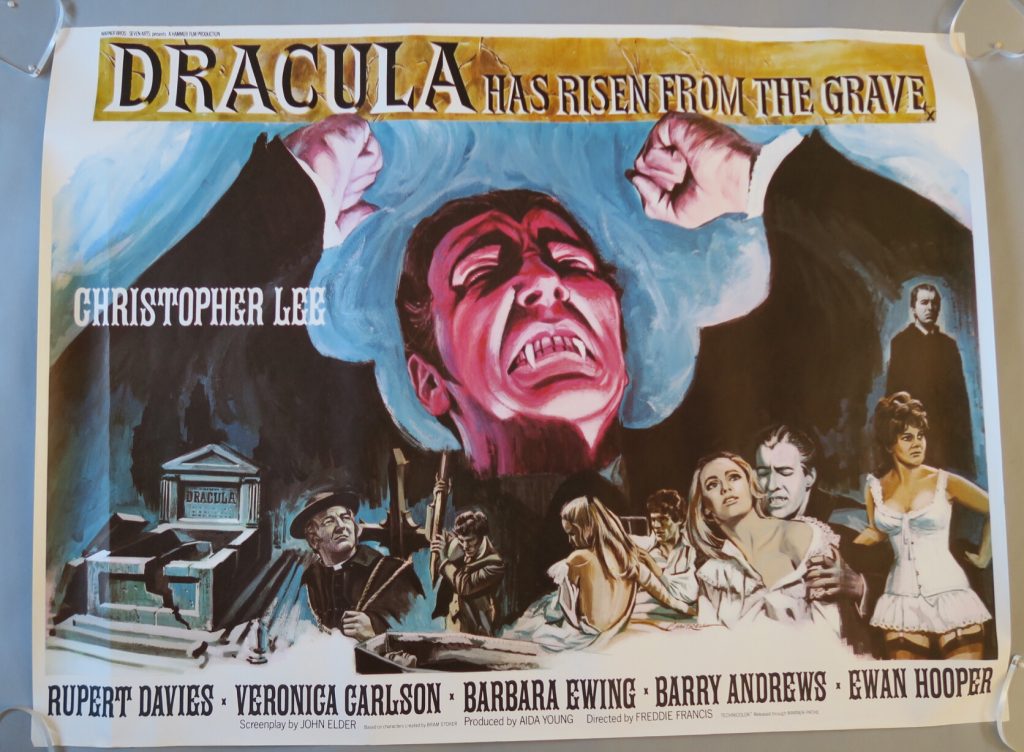 Dracula has Risen from the Grave - art by Tom Chantrell