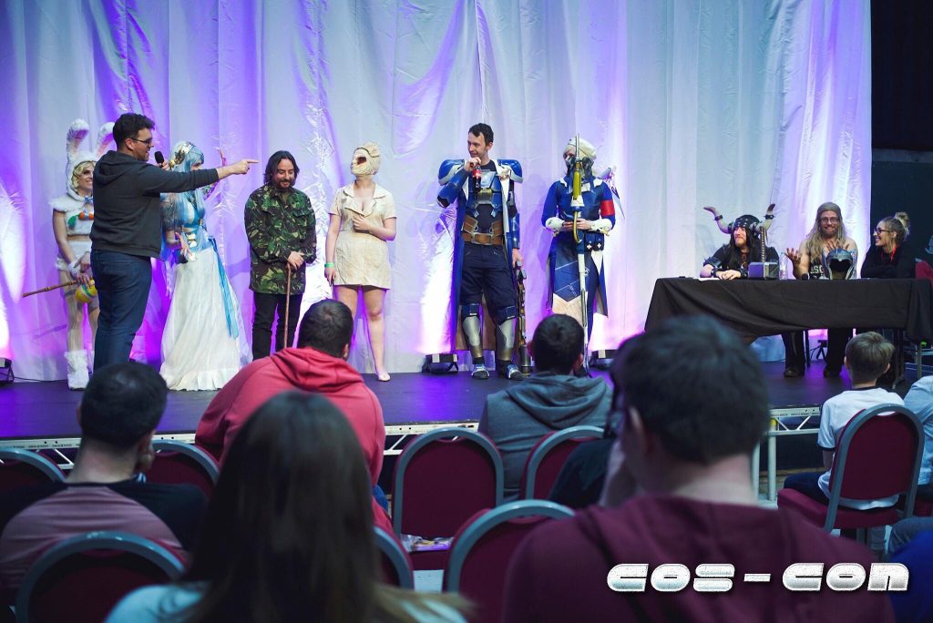 Cos-Con's Host Des O'Gorman, Judges Kitty Lappin, Mighty Cushion Cosplay and Lionheart Cosplay, Entrants Evilblu, Milkystar Cosplay, Katelyn and her partner. Photo: Alasdair Watson Photography