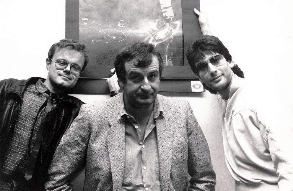Forbidden Planet's Nick Landau, Douglas Adams and author Neil Gaiman at a signing in 1987