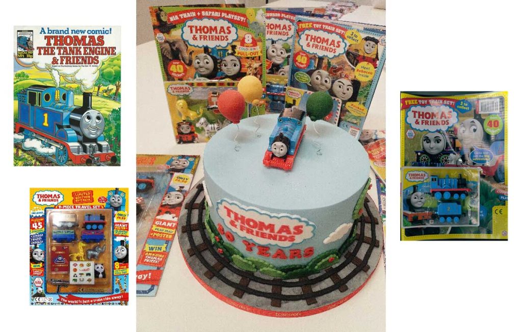 A celebration Thomas & Friends cake and the first issue of the magazine published by Marvel UK as Tank Engine "Thomas and Friends" in 1987 and the current issue of "Thomas and Friends" (Issue 756)