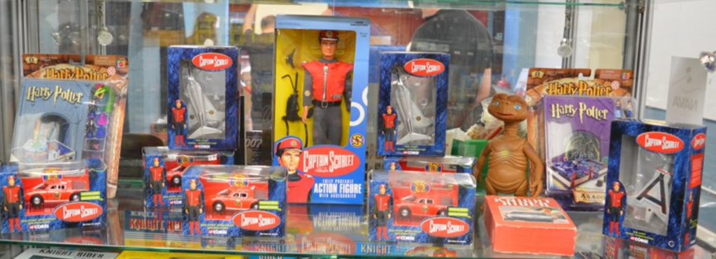 A collection of Captain Scarlet items, including; an action figure, diecast vehicles by Corgi etc, this lot also includes ET, Knight Rider video and some Harry Potter items