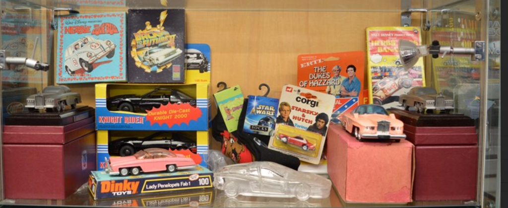A mixed lot which includes; Lady Penelope's Fab 1 diecast model, Kit from Knight Rider, Fab 1 on plinth etc.