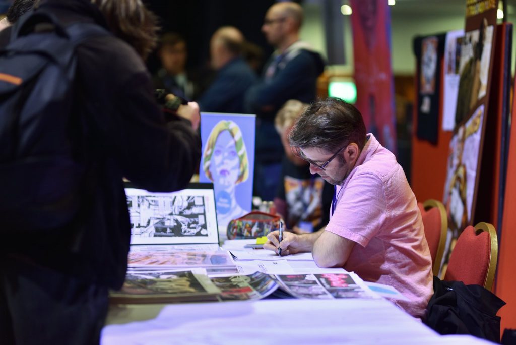 Artist Sean Phillips sketching at the 2019 Portsmouth Comic Con. Image: Portsmouth Comic Con