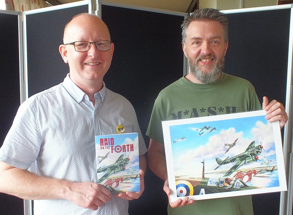 Raid On The Forth's writer/artist Colin Maxwell and cover artist Graeme Neil Reid at Defend Dunfermline Festival in August 2019