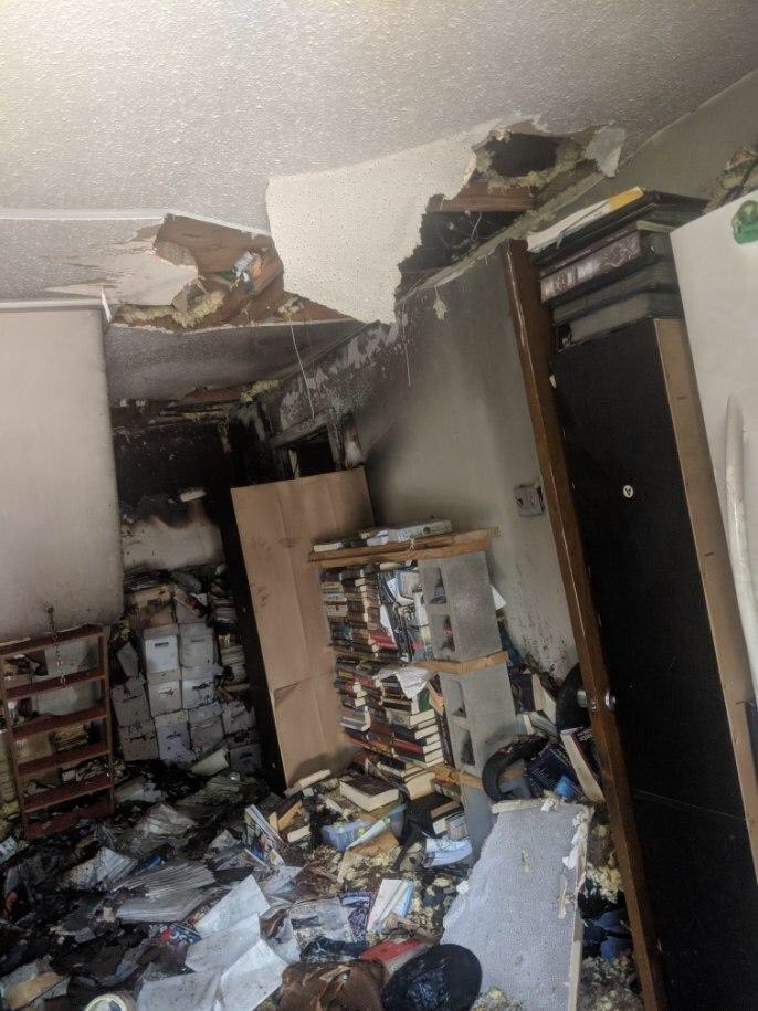 Fire damage after an arson attack on the home of Battlefield Press owner Jonathan Thompson and his family in August 2019
