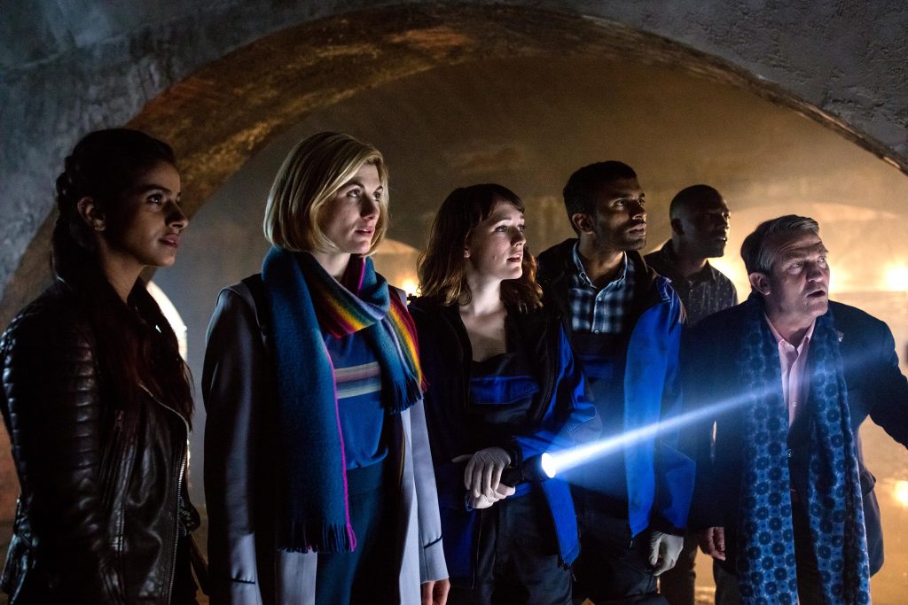 Yaz (Mandip Gill), The Doctor (Jodie Whittaker), Lin (Charlotte Ritchie), Mitch (Nikesh Patel), Ryan (Tosin Cole), Graham (Bradley Walsh) in Doctor Who - Orphan 55. Image: BBC