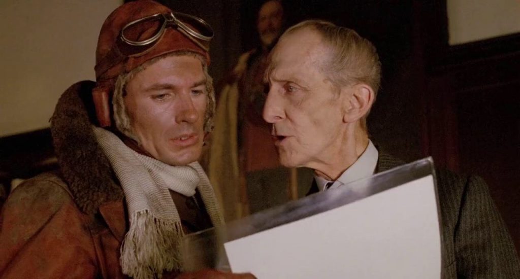 Neil Dickson as Lieutenant James 'Biggles' Bigglesworth and Peter Cushing as Air Commodore William Raymond in a scene from Biggles: Adventures in Time