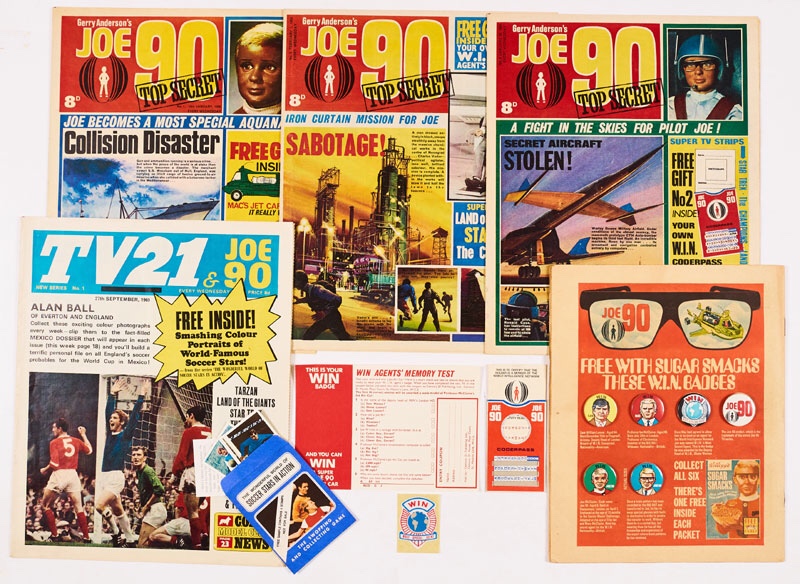 JOE 90 (1969) 1, 2 with free gift W.I.N. Coderpass (mint and unwritten), 3 with free gift W.I.N. Agent's Badge and a complete set of 6 W.I.N. Badges as given away with Kellogg's Sugar Smacks and advertised on the back page of Valiant 7 December 1968, all included here, with TV 21 & JOE 90 No 1 (1969) with free gift - three stamps of Soccer Stars in Action