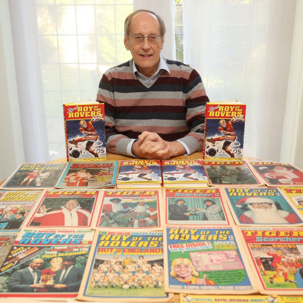 Barrie Tomlinson with just a few of the things he’s edited across his long career. Photo via Barrie Tomlinson