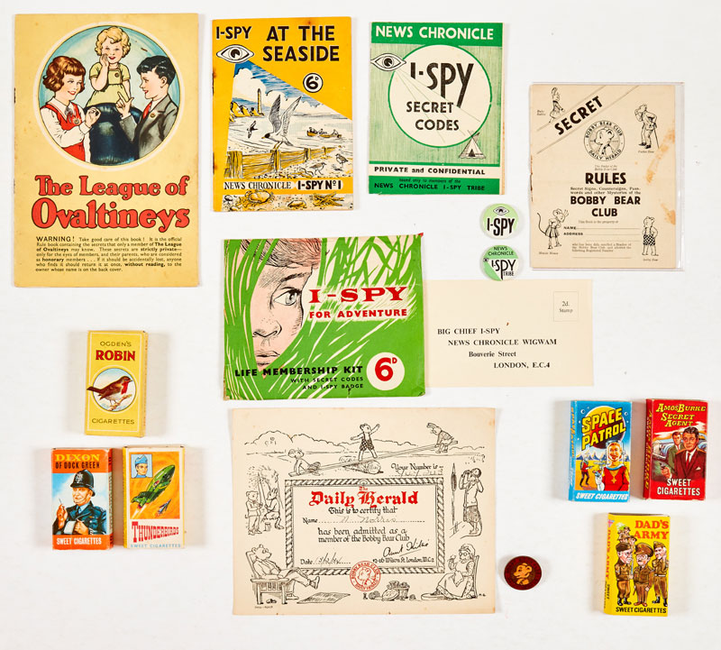 I-Spy for Adventure' Life Membership Kit (News Chronicle, late 1950s) including Secret Codes Book, Big Chief I-Spy Tally card, two I-Spy pin badges, I-Spy No 1 Booklet all complete in original illustrated envelope with Bobby Bear Club (D. Herald 1934) Membership Card, Secret Rules booklet, metal pin badge and The League of Ovaltiney Club Membership Rule Book (1935) and theme song-sheet. With Sweet Cigarette boxes (1960s) Thunderbirds, Amos Burke Secret Agent, Space Patrol (rear image scuffing), Dixon of Dock Green, Dad's Army (1970s), Dad's Army 25 card set and Ogdens Robin Cigarette Packet