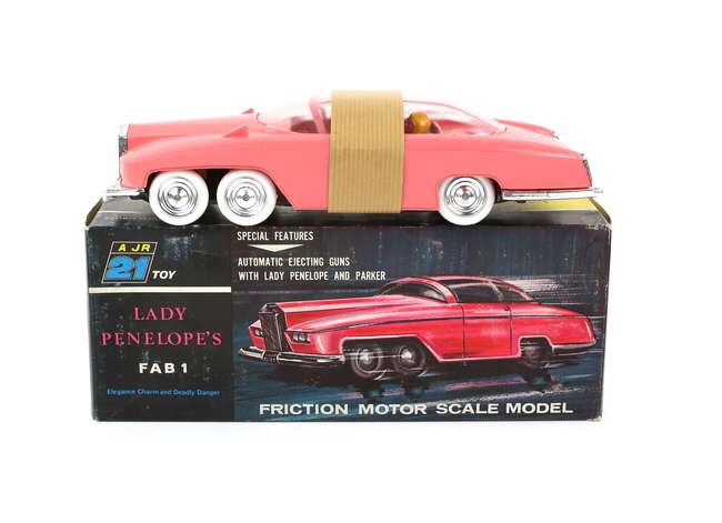 Thunderbirds JR 21 Toy Lady Penelope`s FAB 1, in pink plastic with friction drive, chrome wheels, plastic figures and white tyres, in original box with inner packaging and brown strip protecting roof from wear. Box dimensions 11 x 28 x 8 cm. Image: Ewbanks