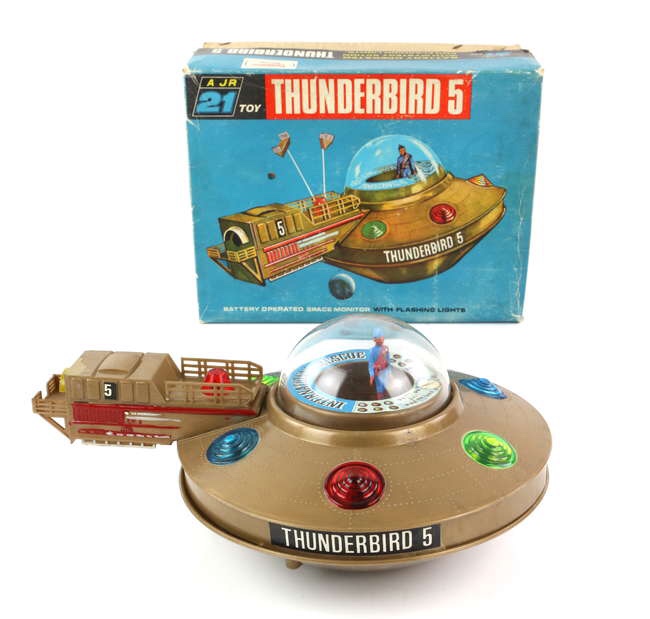 Thunderbirds JR 21 Toy Thunderbirds 5, in brown plastic, plastic figure, in original box with inner packaging and brown strip. Box dimensions 20 x 26 x 12 cm. Image: Ewbanks