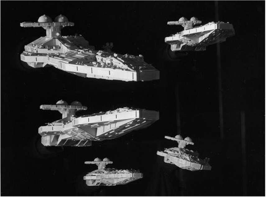 This is a multi-exposure of the Doomlord ship model used in Eagle. "I made the model to be either supported from the front, or the rear," says Julian, a simple L-shaped pole rig with black velvet draped over it. Note how heavily influenced I was by the Star Destroyer design in Star Wars, which I still think is a classic design. Although those in turn were derived from the look of the great Ironclad battleships of the early 20th Century."