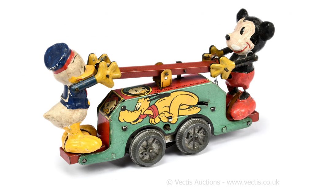 This Wells Mickey Mouse tinplate clockwork hand operated Railway Truck is just one of the thousands of items offered by Vectis at auction every year