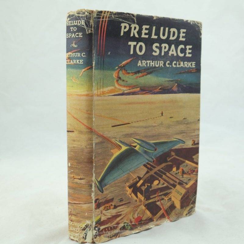 Arthur C. Clarke wrote Prelude to Space, his first SF novel, in 1947, in only twenty days, but it was not published until 1951, first serialised in the magazine Galaxy Novels. Publication in book form was only in 1953 by Sidgwick & Jackson in the UK, with an eye-catching cover by Gerard Quinn | Photo: Hyraxia Books