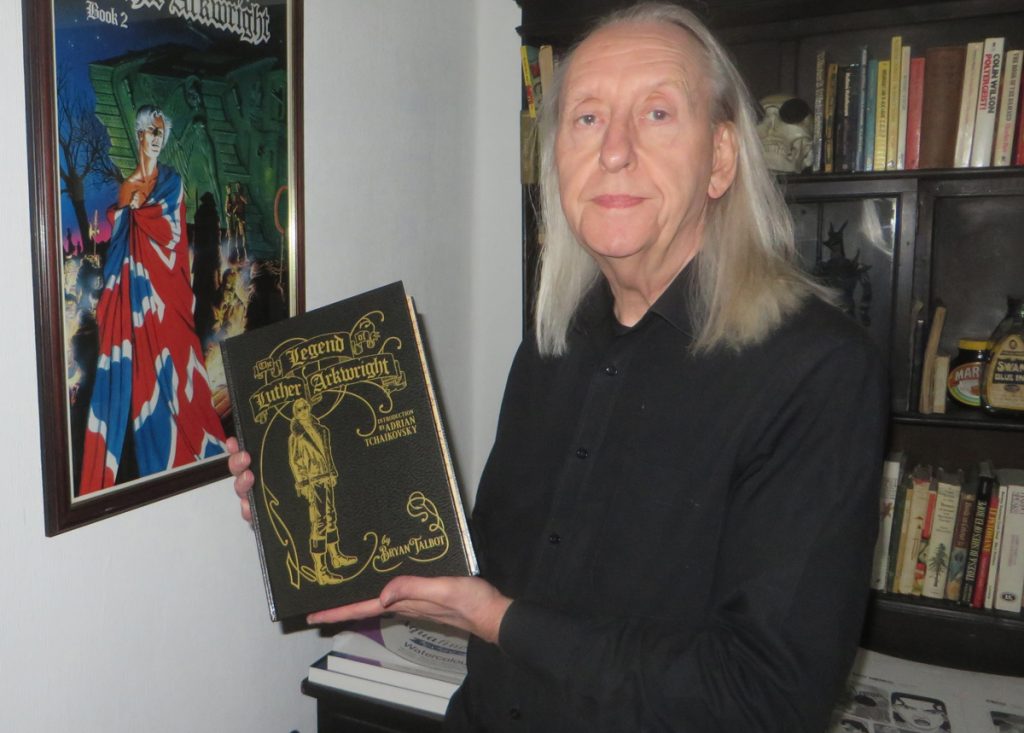 Bryan Talbot with an early copy of the Legend of Luther Arkwright. Photo courtesy Bryan Talbot