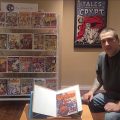 Dave Dustin with his copy of Commando Comics, published by Cartoon Art Productions
