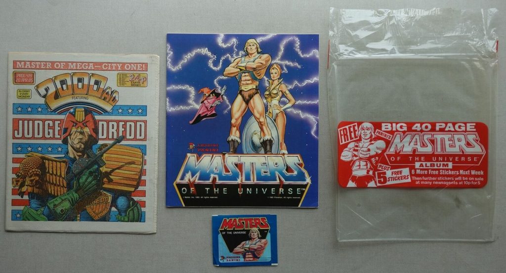 2000AD Prog 414 - cover dated Apr 20 1985, with Free Gift He-Man Sticker Album Stickers, and Bag