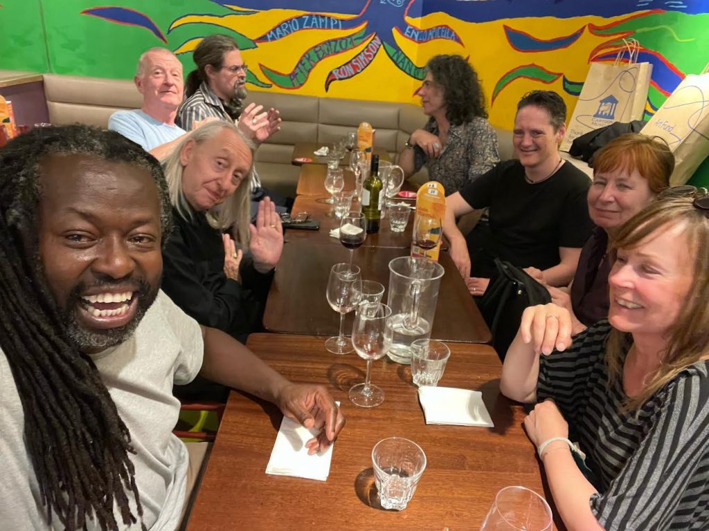 Bryan and company sharing a post event pizza. Left to right: Yomi Ayeni, Steve Davis, Adrian Tchaikovsky, Bryan, Kavus Torabi, Matt Green, Mary Talbot and Claire Ayeni. Matt Green’s a lecturer at Nottingham University, who’s writing an academic book about Bryan’s work - "Politics and Imagination in the Graphic Novels of Bryan Talbot”. He did the book on Alan Moore a few years ago