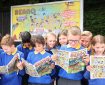 Pupils from Voyager Year 5 class at Whitehill Junior School unveil a billboard illustrating their winning joke as they are presented with the Beano ‘Britain’s Funniest Class’ trophy, Hertfordshire. Picture date: Wednesday June 29, 2022. The class came up with the winning joke, “What do you call a class of children who eat potatoes using their toes? - The Mash Street Kids!”. The competition was fierce this year with hilarious jokes coming in from across the nation and receiving over 190,000 votes by the public. The annual initiative, created by Beano in partnership with young people’s mental health charity YoungMinds, is now in its fourth year. Photo credit should read: Joe Pepler / PinPep