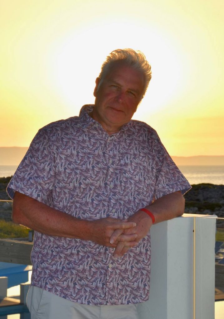 Leigh Baulch of Titan Entertainment heads off into the sunset, many toy figures chasing him...