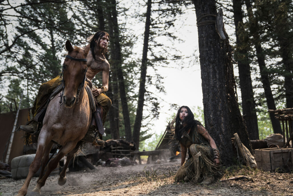 Dakota Beavers (on horseback) and Amber Midthunder stars in Dan Trachtenberg's Prey, the latest entry in the “Predator” film series