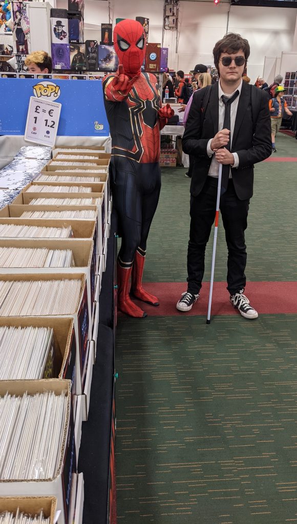 Cosplayers and back issue comics at Dublin Comic Con Summer Edition 2022. Photo: James Bacon
