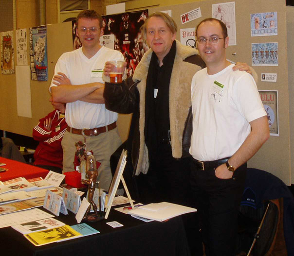 Colin Mathieson and Dave West with artist Bryan Talbot at Komiks.DK Copenhagen in 2004