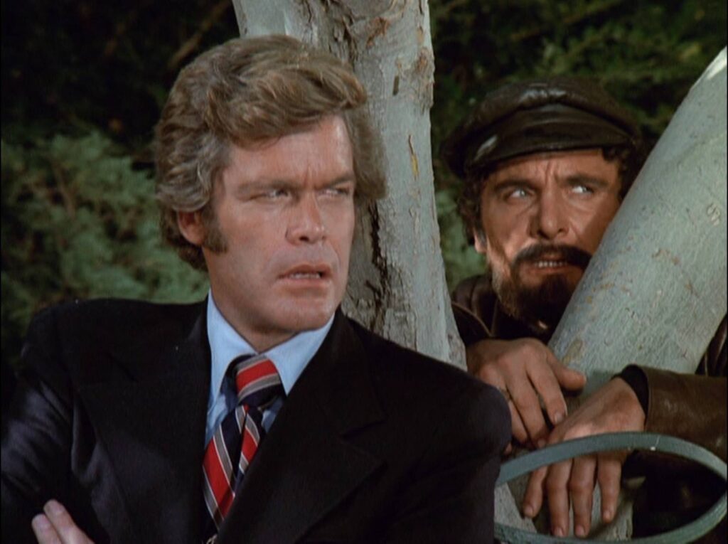 Doug McClure (CR Grover) and Michael Pataki (Pierre Karim) in the Search episode "The Packagers." The episode was written by Robert C. Dennis and directed by Michael Caffey