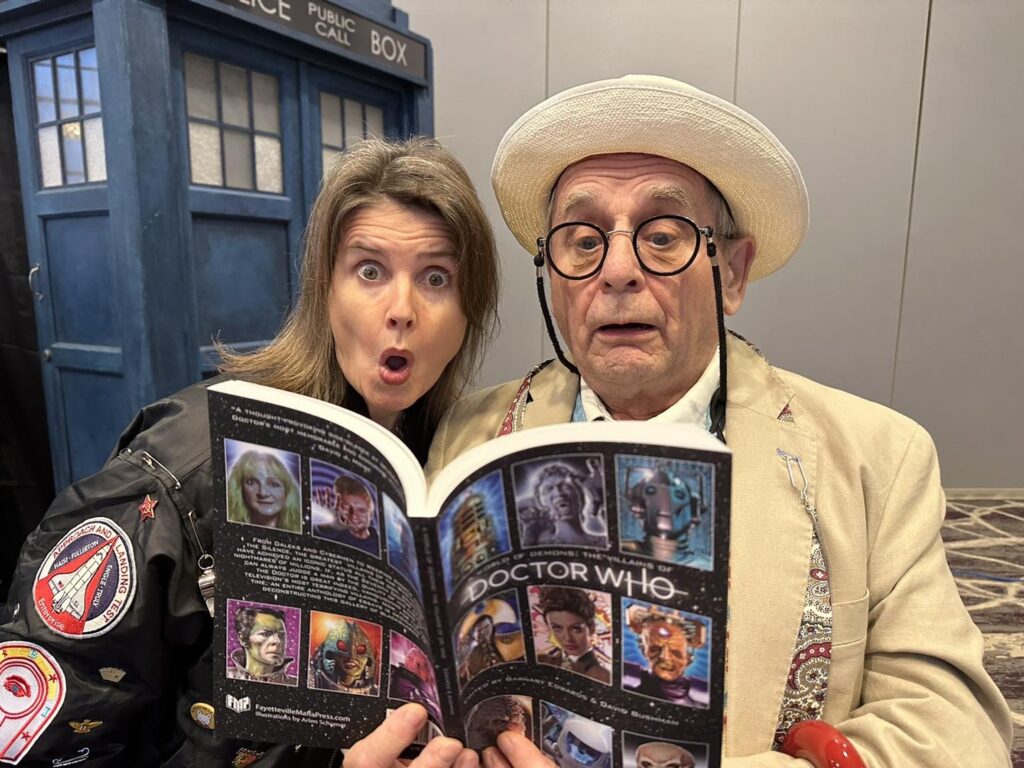The Doctor and Ace enjoying the first Doctor Who book from Fayetteville Mafia Press. Photo: Fayetteville Mafia Press