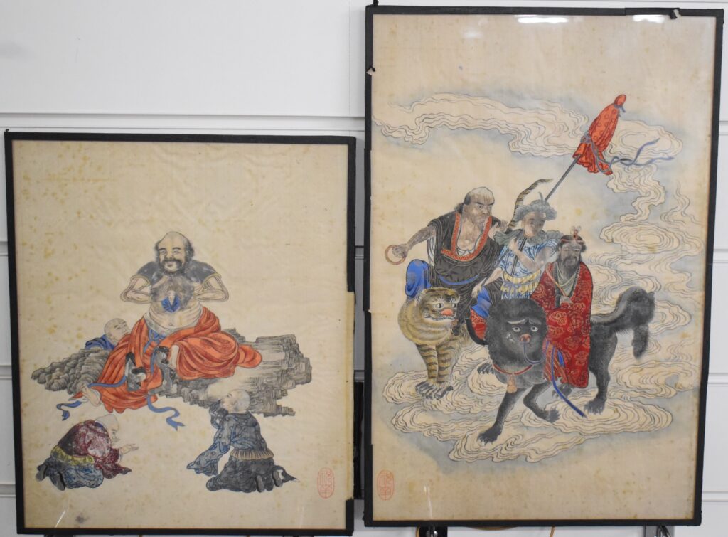 Two 19th / 20thC Japanese watercolours on woven silk, one a court scene the other riders of fantastical beasts, largest 39 x 25cm