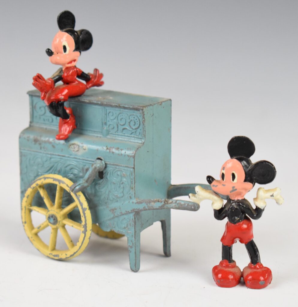 Saalheimer & Co Salco 1940's diecast model Disney Mickey and Minnie Mouse barrel organ musical box with blue body, cream wheels and two figures