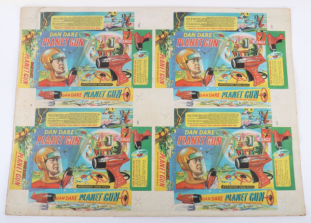 A Merit Toys Eagle Dan Dare Planet Gun box lids Printers proof sheet, four box lids printed on card sheet, in good original condition, some edge wear, slight staining to top left hand corner 32 ½” (83cms) x 24 ½ “ (62cms)