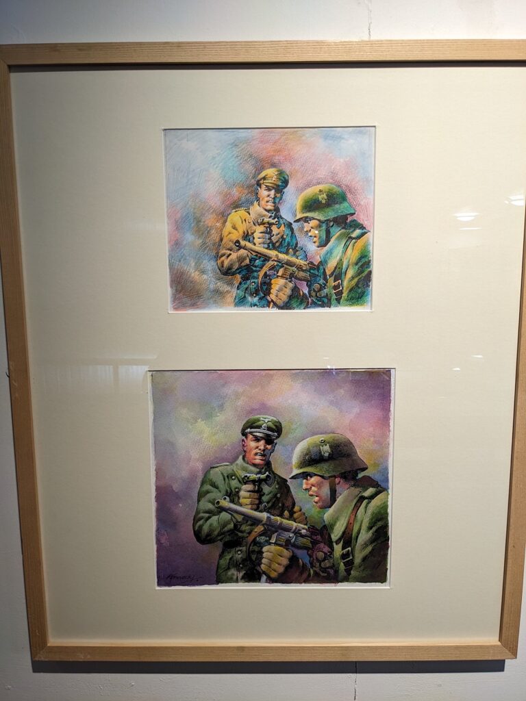 Ian Kennedy - Celebrating a Comics Legend Exhibition 2023. Mock up and final cover Commando comic 5503, “SS Colonel“ (2022)