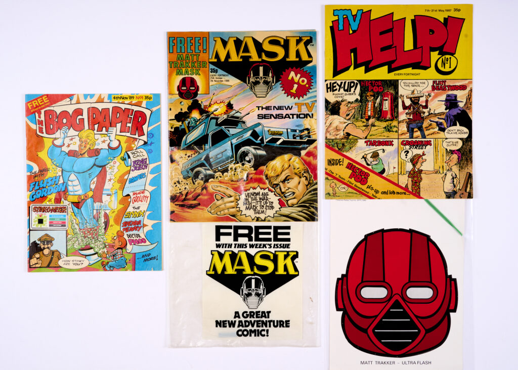 Mask 1 (1986) [fn]. Wfg Matt Trakker mask and Mask Super Preview issue [vfn]. With T.V. Help No 1 (1987) and The Bog Paper No 1 (1989) wfg Stink-o-Meter (4). No Reserve
