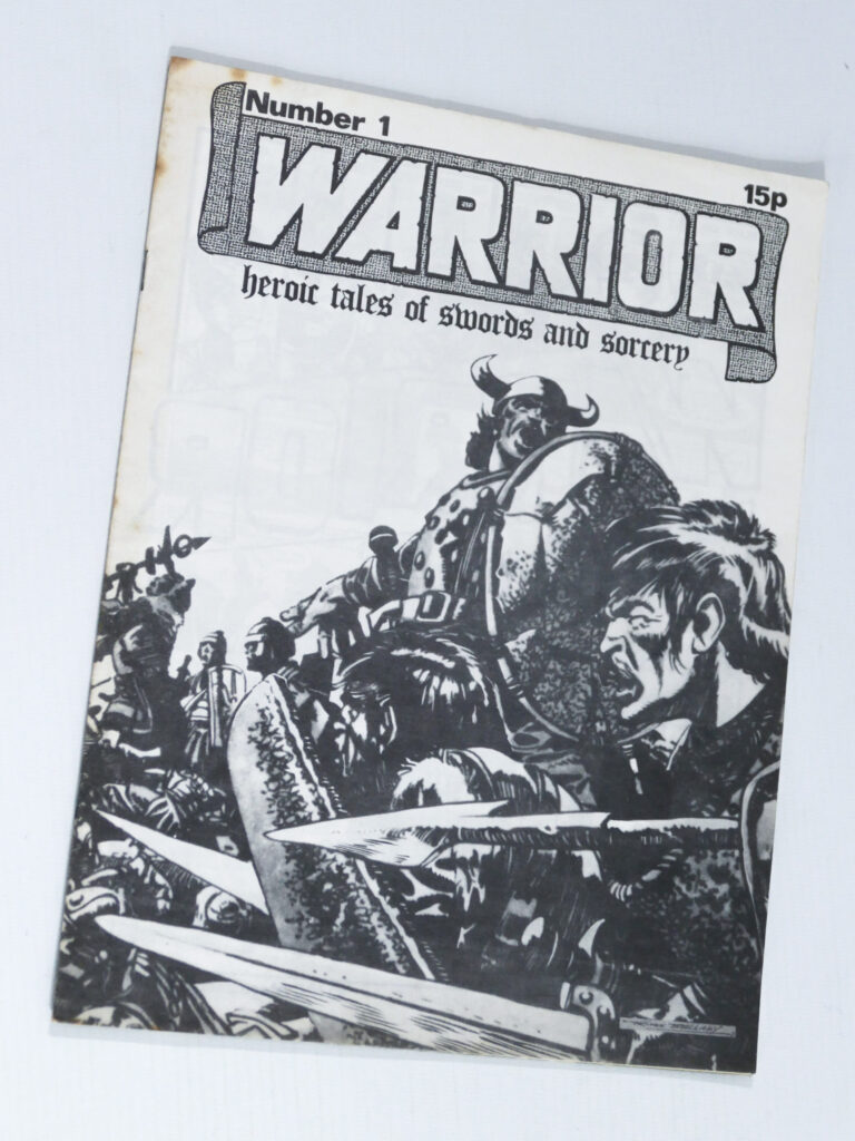 Warrior #1, published in 1974, Dez Skinn's first take on the 'Warrior' brand, featuring reprints of "Wrath of the Gods", art by John M. Burns, "Kelpie - Boy Wizard" art by John M Burns, "Erik the Viking", art by Don Lawrence, "Heros the Spartan", art by Frank Bellamy, "Olac the Gladiator", art by Don Lawrence, and "Black Axe - Saxon Avenger" by Tom Kerr